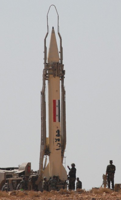 The Syrian military perform a live ammunitions exercise in an undisclosed location in this undated handout photo distributed by Syrian News Agency