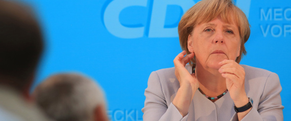 Angela Merkel, Germany's chancellor, pauses while speaking during a campaign event in Boldekow, Germany, on Thursday, Aug. 18, 2016. Merkel said fighting crime and Islamist terror will be key challenges for years, adopting a law-and-order stance after attacks in Germany eroded her approval rating. Photographer: Krisztian Bocsi/Bloomberg via Getty Images