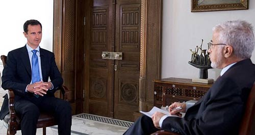 الرئيس بشار الأسد خلال مقابلة مع التلفزيون البرتغالي